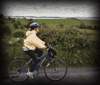 Carolyn riding along a flat stretch near Lough Mask